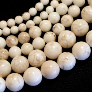 Boule de magnésite blanche brillante env. 4-12mm, 1 brin